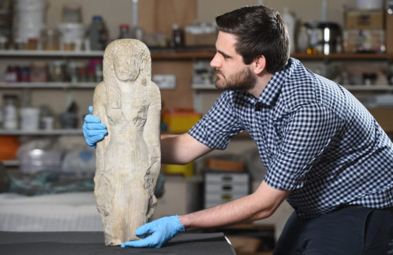 Dr Daniel Potter with the Montrose museum statue.