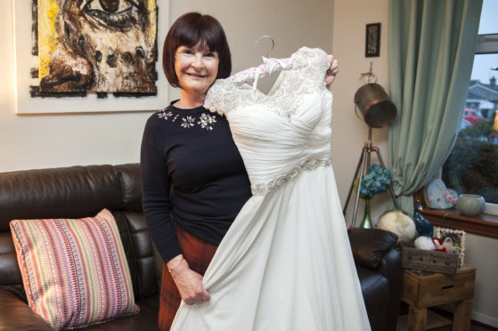 https://www.thecourier.co.uk/wp-content/uploads/sites/12/2019/12/PSmi_Audrey_Foreman_who_has_offered_her_wedding_dress_071219_04-559x372.jpg