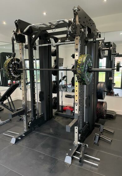 Weight rack in Jonathan's home gym